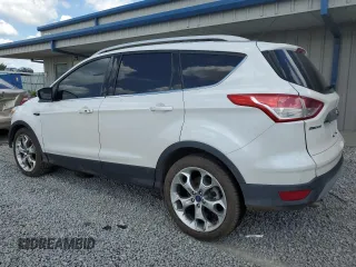 2015 Ford Escape Titanium z VIN 1FMCU9J90FUC41606, wystawiony jako Copart lot #57458455 z przebiegiem 71 671 mil mil oraz Szkoda całkowita • Salvage title. Historia ofert i sprzedaży dostępna na DreamBid. Obrazek 2.
