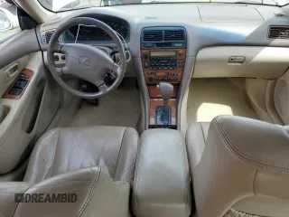 2000 Lexus ES 300 with VIN JT8BF28G6Y5099537, listed as a Copart auction lot 61873595 with 167,090 mi miles and Salvage title. Bid and sale history available at DreamBid. Image 8.