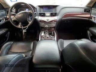 2013 Infiniti M with VIN JN1BY1AR3DM604891, listed as a Copart auction lot 68091914 with 128,799 mi miles and Clean Title. Bid and sale history available at DreamBid. Image 8.