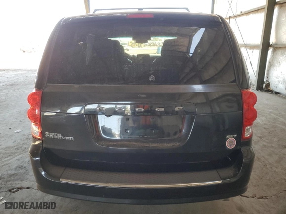 2014 Dodge Grand Caravan SXT with VIN 2C4RDGCG5ER362058, listed as a Copart auction lot 77763684 with 127,559 mi miles and Clean Title. Bid and sale history available at carsss.com. Image 6.