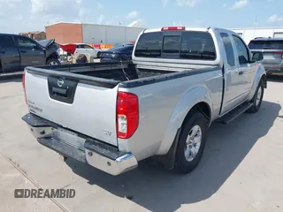 2013 Nissan Frontier SV with VIN 1N6AD0CUXDN763835, listed as a IAAI auction lot 42519926 with 208,577 mi miles and . Bid and sale history available at DreamBid. Image 4.