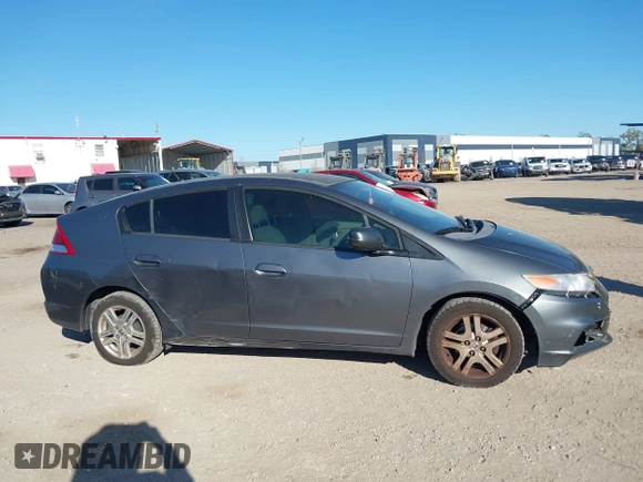 2012 Honda Insight LX with VIN JHMZE2H51CS003694, listed as a IAAI auction lot 41781384 with 154,685 mi miles and . Bid and sale history available at DreamBid. Image 13.