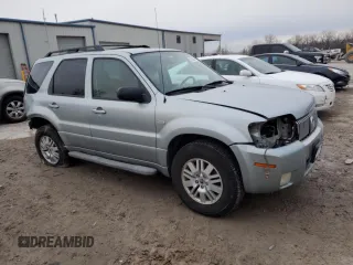 2005 Mercury Mariner Luxury z VIN 4M2CU57105DJ33266, wystawiony jako Copart lot #87002044 z przebiegiem 164 313 mil mil oraz Szkody całkowita. Historia ofert i sprzedaży dostępna na DreamBid. Obrazek 4.