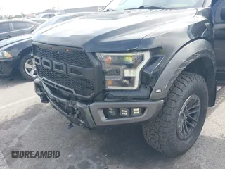 2020 Ford F-150 Raptor with VIN 1FTFW1RG2LFA30858, listed as a IAAI auction lot 42192391 with 90,018 mi miles and . Bid and sale history available at carsss.com. Image 6.