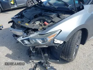 2018 Nissan Maxima SV with VIN 1N4AA6AP2JC385535, listed as a IAAI auction lot 42299100 with 81,431 mi miles and . Bid and sale history available at DreamBid. Image 22.