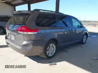 2011 Toyota Sienna XLE AAS with VIN 5TDYK3DC7BS047822, listed as a IAAI auction lot 42073635 with 150,424 mi miles. Bid and sale history available at carsss.com. Image 4.