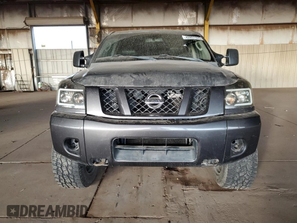 2011 Nissan Titan SL with VIN 1N6AA0EC3BN313227, listed as a Copart auction lot 42857425 with 180,084 mi miles and Salvage Title. Bid and sale history available at carsss.com. Image 5.