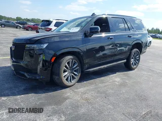 2023 Cadillac Escalade 4WD Sport z VIN 1GYS4EKLXPR513435, wystawiony jako IAAI lot #42137452 z przebiegiem 27 495 mil mil oraz . Historia ofert i sprzedaży dostępna na DreamBid. Obrazek 18.