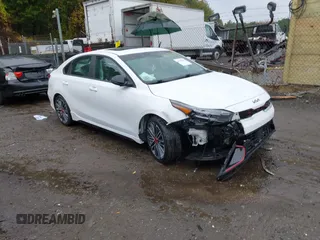 2022 Kia Forte GT with VIN 3KPF44AC9NE460058, listed as a IAAI auction lot 40385898 with 57,961 mi miles. Bid and sale history available at carsss.com. Image 1.