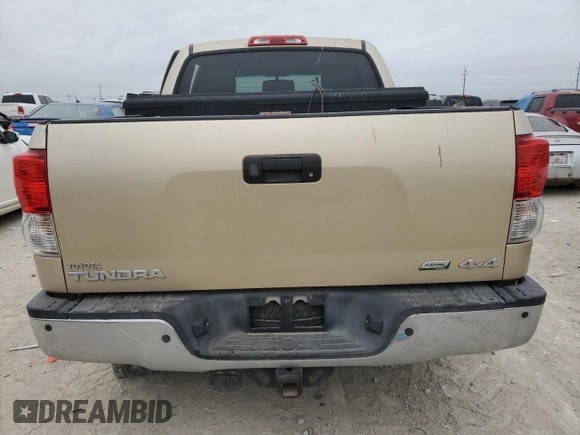 2010 Toyota Tundra Limited z VIN 5TFHW5F14AX095802, wystawiony jako Copart lot #42676385 z przebiegiem Nie podano mil oraz Szkoda całkowita • Salvage title. Historia ofert i sprzedaży dostępna na DreamBid. Obrazek 6.