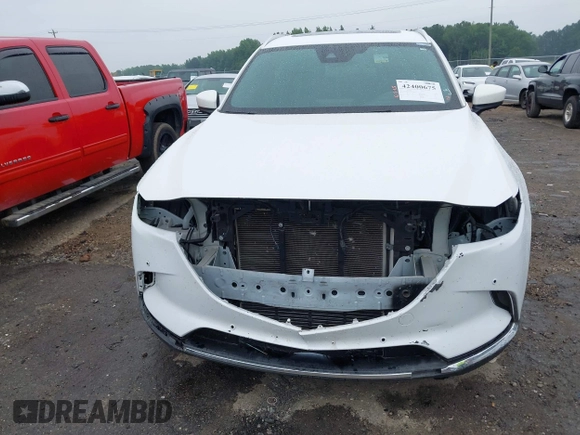 2021 Mazda CX-9 Signature with VIN JM3TCBEY4M0517118, listed as a IAAI auction lot 42400675 with 56,260 mi miles and . Bid and sale history available at DreamBid. Image 13.