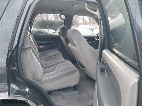 2003 GMC Yukon SLT with VIN 1GKEC13Z63R166721, listed as a IAAI auction lot 41266638 with 246,888 mi miles. Bid and sale history available at carsss.com. Image 8.