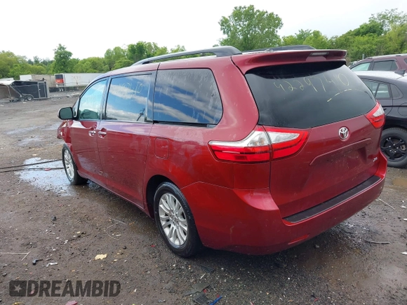2015 Toyota Sienna XLE with VIN 5TDYK3DC9FS569714, listed as a IAAI auction lot 42297410 with 114,802 mi miles and . Bid and sale history available at DreamBid. Image 3.