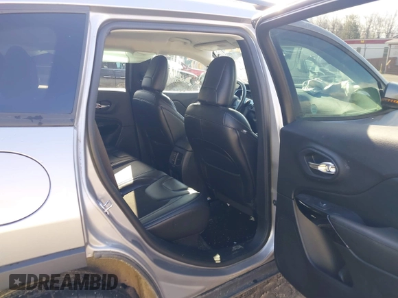 2019 Jeep Cherokee Latitude Plus with VIN 1C4PJMLB0KD320947, listed as a IAAI auction lot 41225801 with 64,537 mi miles and . Bid and sale history available at DreamBid. Image 8.