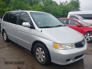 2002 Honda Odyssey EX-L z VIN 2HKRL18082H526908, wystawiony jako IAAI lot #42257952 z przebiegiem 167 340 mil mil oraz . Historia ofert i sprzedaży dostępna na DreamBid. Obrazek 1.