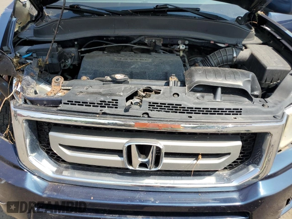 2010 Honda Ridgeline RTL with VIN 5FPYK1F5XAB004153, listed as a Copart auction lot 59710535 with Not provided miles and Salvage title. Bid and sale history available at DreamBid. Image 11.