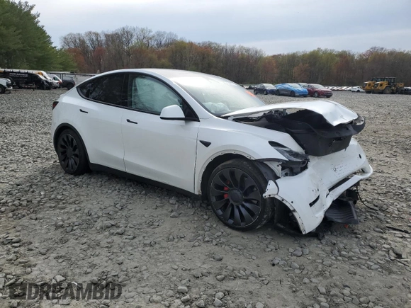 2022 Tesla Model Y Performance with VIN 7SAYGDEF9NF564566, listed as a Copart auction lot 53799715 with 38,963 mi miles and Salvage title. Bid and sale history available at DreamBid. Image 4.