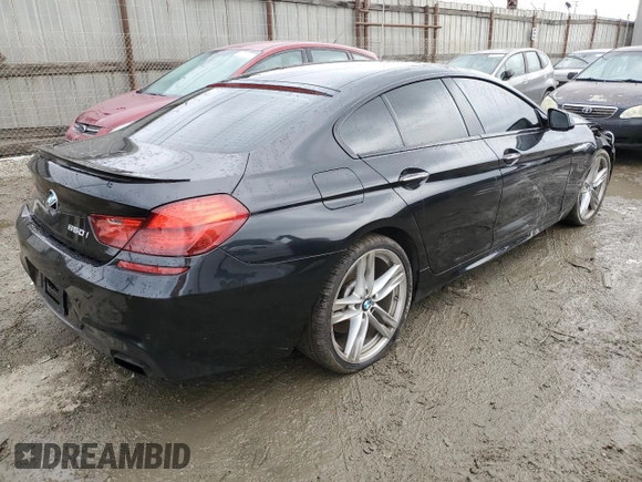 2014 BMW 6 Series 650i z VIN WBA6B2C5XED128959, wystawiony jako Copart lot #44201745 z przebiegiem 146 875 mil mil oraz Szkoda całkowita • Salvage title. Historia ofert i sprzedaży dostępna na DreamBid. Obrazek 3.