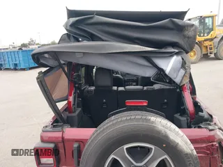 2021 Jeep Wrangler Unlimited Willys with VIN 1C4HJXDN5MW840857, listed as a IAAI auction lot 41885671 with 19,709 mi miles and . Bid and sale history available at DreamBid. Image 6.