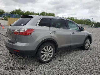 2010 Mazda CX-9 Grand Touring z VIN JM3TB3MA5A0219220, wystawiony jako Copart lot #56829425 z przebiegiem 196 016 mil mil oraz Szkoda całkowita • Salvage title. Historia ofert i sprzedaży dostępna na DreamBid. Obrazek 3.