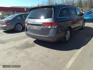 2014 Honda Odyssey LX with VIN 5FNRL5H24EB025817, listed as a IAAI auction lot 41904759 with 161,523 mi miles. Bid and sale history available at carsss.com. Image 4.