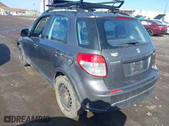2012 Suzuki SX4 Crossover with VIN JS2YB5A34C6303762, listed as a IAAI auction lot 41840102 with 118,325 mi miles and . Bid and sale history available at carsss.com. Image 3.