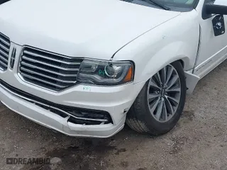 2015 Lincoln Navigator L with VIN 5LMJJ3JT7FEJ05280, listed as a IAAI auction lot 41476190 with 124,580 mi miles. Bid and sale history available at carsss.com. Image 6.