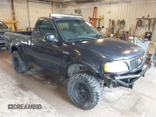 2001 Ford F-150 z VIN 1FTZF182X1KA13166, wystawiony jako IAAI lot #42513979 z przebiegiem 197 994 mil mil oraz . Historia ofert i sprzedaży dostępna na DreamBid. Obrazek 1.