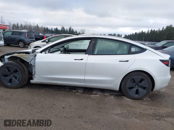 2021 Tesla Model 3 Long Range with VIN 5YJ3E1EB3MF856009, listed as a IAAI auction lot 41809767 with 42,072 mi miles. Bid and sale history available at carsss.com. Image 15.