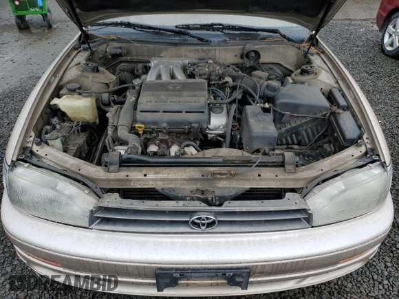 1994 Toyota Camry XLE with VIN JT2GK13E4R0053523, listed as a Copart auction lot 46646995 with 172,091 mi miles and Salvage Title. Bid and sale history available at carsss.com. Image 11.