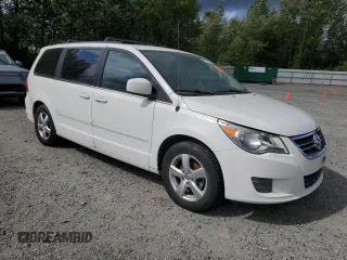 2011 Volkswagen Routan SE with VIN 2V4RW3DG0BR789523, listed as a Copart auction lot 61761785 with 124,530 mi miles and Clean title. Bid and sale history available at DreamBid. Image 4.