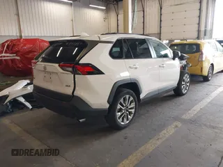 2020 Toyota RAV4 XLE Premium with VIN 2T3C1RFV1LC042163, listed as a IAAI auction lot 40672979 with 76,016 mi miles. Bid and sale history available at carsss.com. Image 4.