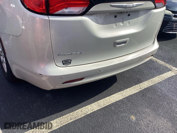 2017 Chrysler Pacifica Touring with VIN 2C4RC1DG5HR764942, listed as a IAAI auction lot 42581325 with 64,391 mi miles and . Bid and sale history available at DreamBid. Image 1.