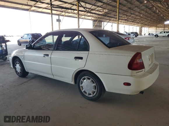 2001 Mitsubishi Mirage ES z VIN JA3AY26CX1U013535, wystawiony jako Copart lot #57664885 z przebiegiem 159 095 mil mil oraz Szkoda całkowita • Salvage title. Historia ofert i sprzedaży dostępna na DreamBid. Obrazek 2.
