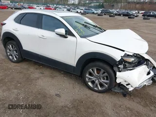 2021 Mazda CX-30 Premium with VIN 3MVDMBDL4MM310630, listed as a IAAI auction lot 41868655 with 35,742 mi miles and . Bid and sale history available at DreamBid. Image 1.