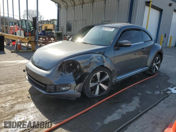2012 Volkswagen Beetle with VIN 3VWV87AT3CM609968, listed as a Copart auction lot 50916325 with 148,004 mi miles and Salvage Title. Bid and sale history available at DreamBid. Image 1.