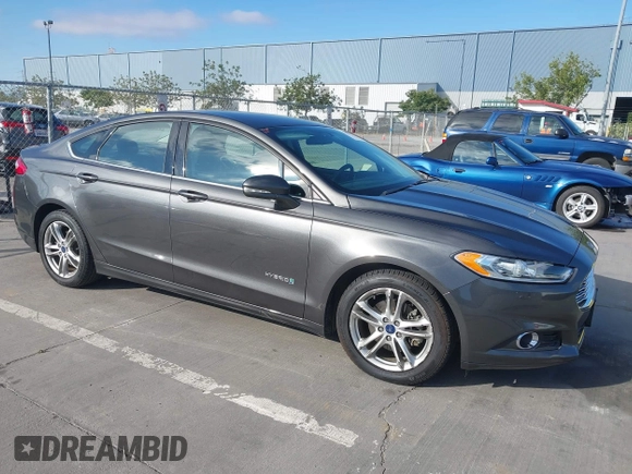 2016 Ford Fusion SE Hybrid z VIN 3FA6P0LU6GR145421, wystawiony jako IAAI lot #42650918 z przebiegiem 105 990 mil mil oraz . Historia ofert i sprzedaży dostępna na DreamBid. Obrazek 1.
