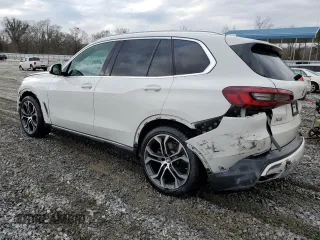 2021 BMW X5 sDrive40i with VIN 5UXCR4C04M9E30879, listed as a Copart auction lot 39577953 with 19,276 mi miles. Bid and sale history available at carsss.com. Image 2.