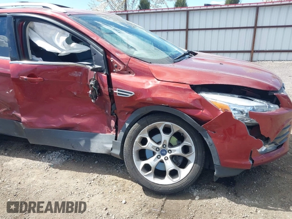 2014 Ford Escape Titanium with VIN 1FMCU9J91EUB53601, listed as a IAAI auction lot 42066465 with 105,933 mi miles and . Bid and sale history available at DreamBid. Image 6.
