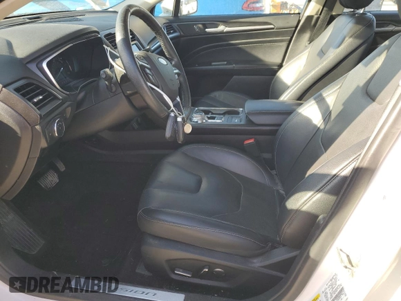 2019 Ford Fusion Hybrid Titanium with VIN 3FA6P0RU0KR277431, listed as a Copart auction lot 48234545 with 87,043 mi miles and Salvage Title. Bid and sale history available at carsss.com. Image 7.