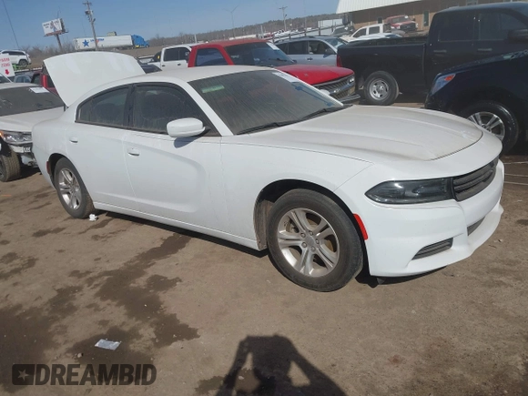 2021 Dodge Charger SXT with VIN 2C3CDXBG5MH605867, listed as a IAAI auction lot 41682336 with 56,660 mi miles and . Bid and sale history available at DreamBid. Image 1.
