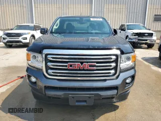 2015 GMC Canyon 2WD SLE with VIN 1GTH5BEA7F1147162, listed as a Copart auction lot 58018514 with 68,014 mi miles and Salvage Title. Bid and sale history available at carsss.com. Image 5.