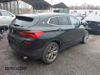 2020 BMW X2 xDrive28i z VIN WBXYJ1C07L5P76055, wystawiony jako IAAI lot #41947611 z przebiegiem 38 277 mil mil oraz . Historia ofert i sprzedaży dostępna na DreamBid. Obrazek 4.