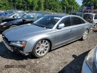 2012 Audi A8 z VIN WAURVAFDXCN001167, wystawiony jako Copart lot #57227105 z przebiegiem 154 409 mil mil oraz Szkoda całkowita • Salvage title. Historia ofert i sprzedaży dostępna na DreamBid. Obrazek 1.