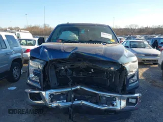 2015 Ford F-150 XLT with VIN 1FTEW1EP7FFD00589, listed as a IAAI auction lot 41677203 with 156,064 mi miles. Bid and sale history available at carsss.com. Image 12.