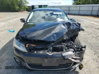 2014 Volkswagen Jetta SEL z VIN 3VWL17AJ2EM390112, wystawiony jako Copart lot #58094365 z przebiegiem Nie podano mil oraz Czysty tytuł • Clean title. Historia ofert i sprzedaży dostępna na DreamBid. Obrazek 5.