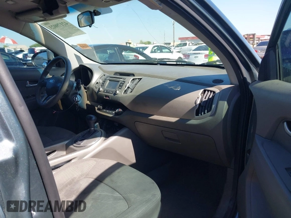 2015 Kia Sportage LX with VIN KNDPB3ACXF7696918, listed as a IAAI auction lot 42179023 with 64,181 mi miles and . Bid and sale history available at DreamBid. Image 5.