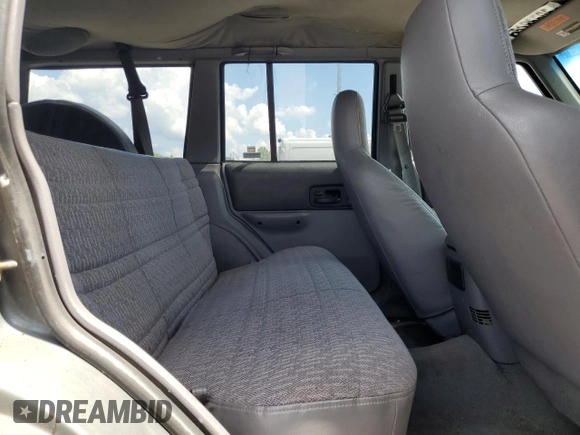 1998 Jeep Cherokee Sport with VIN 1J4FJ68S6WL215447, listed as a Copart auction lot 65186505 with 177,682 mi miles and Clean title. Bid and sale history available at DreamBid. Image 11.