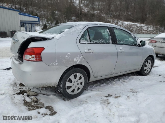 2011 Toyota Yaris with VIN JTDBT4K37B1401590, listed as a Copart auction lot 46142555 with 165,082 mi miles and Salvage Title. Bid and sale history available at carsss.com. Image 3.