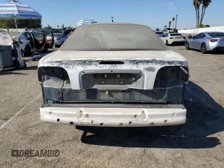 1995 Ford Mustang GT with VIN 1FALP42T7SF174211, listed as a Copart auction lot 77635124 with 158,940 mi miles and Salvage title. Bid and sale history available at DreamBid. Image 6.